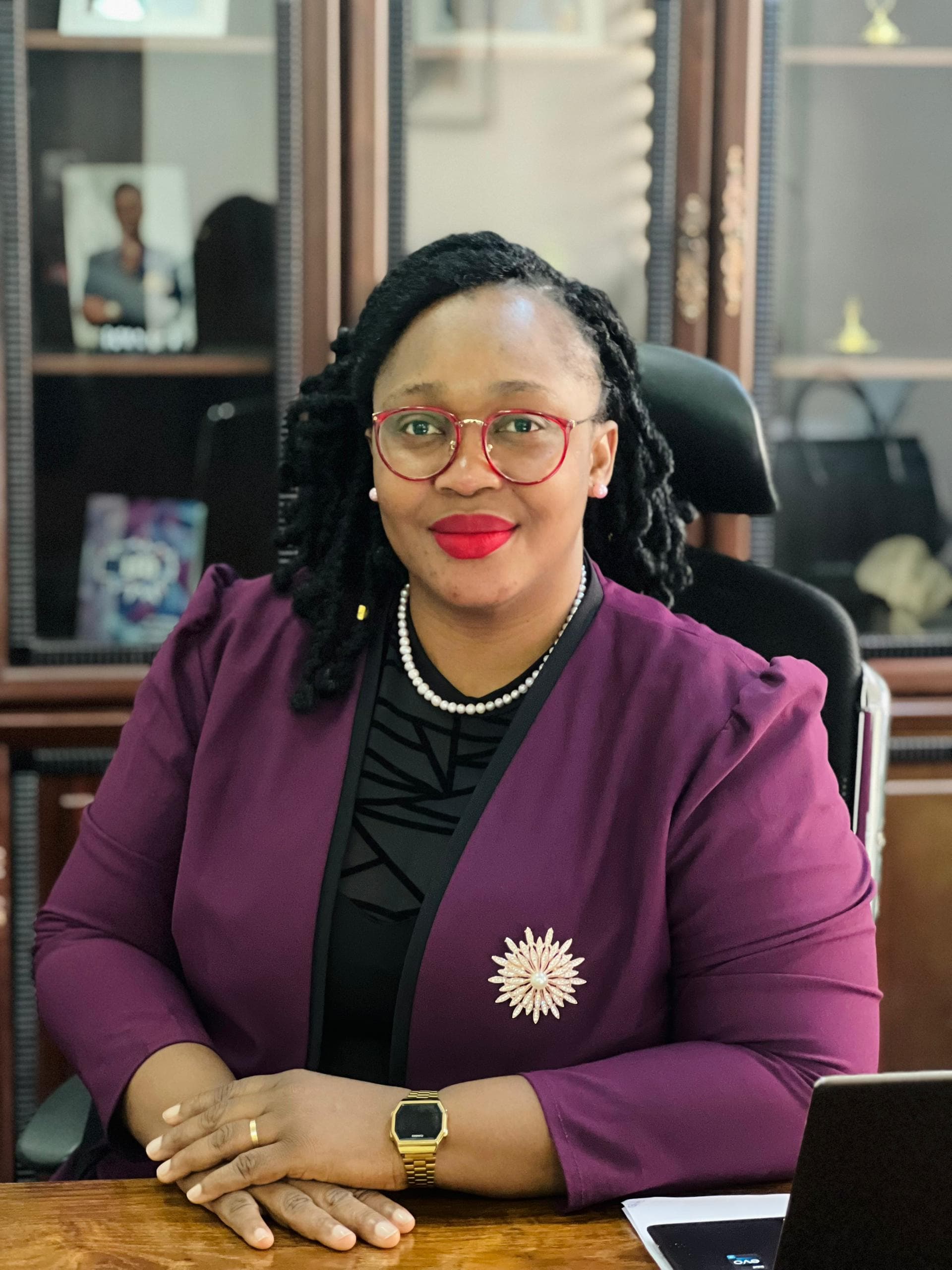 Mme Elise KOIVOGUI